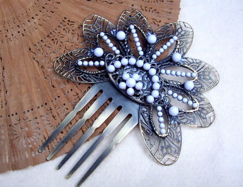   SPANISH MANTILLA COMB IN STAR DESIGN WITH WHITE CERAMIC EMBELLISHMENTS